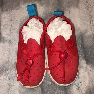 Red Native brand toddler sneakers